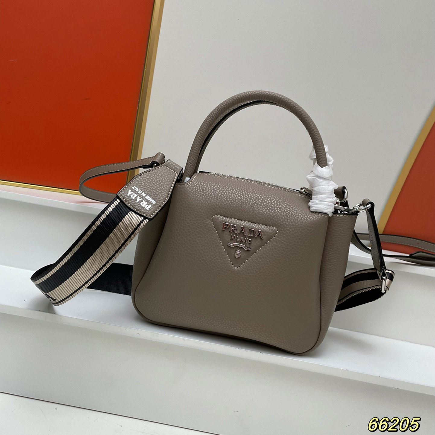 Pra*a top handle bags